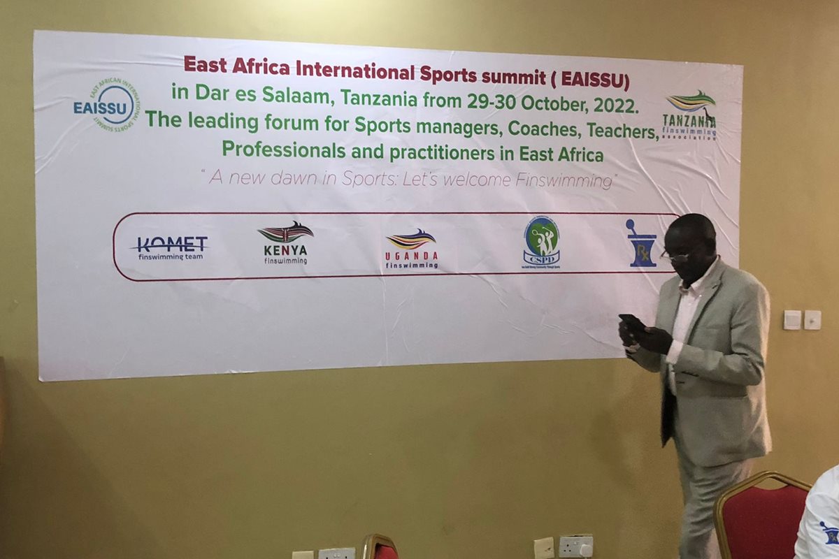 EAISSU 2022 banner in Dar es Salaam with the logos of Komet and the Kenyan and Ugandan finswimming associations
